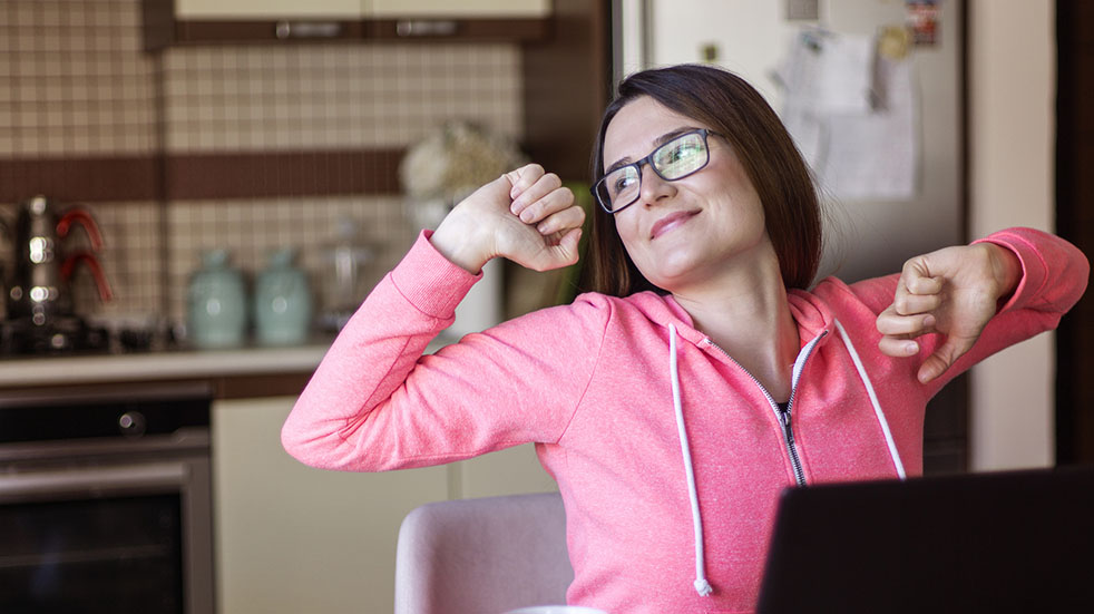 Working from home; woman yawning